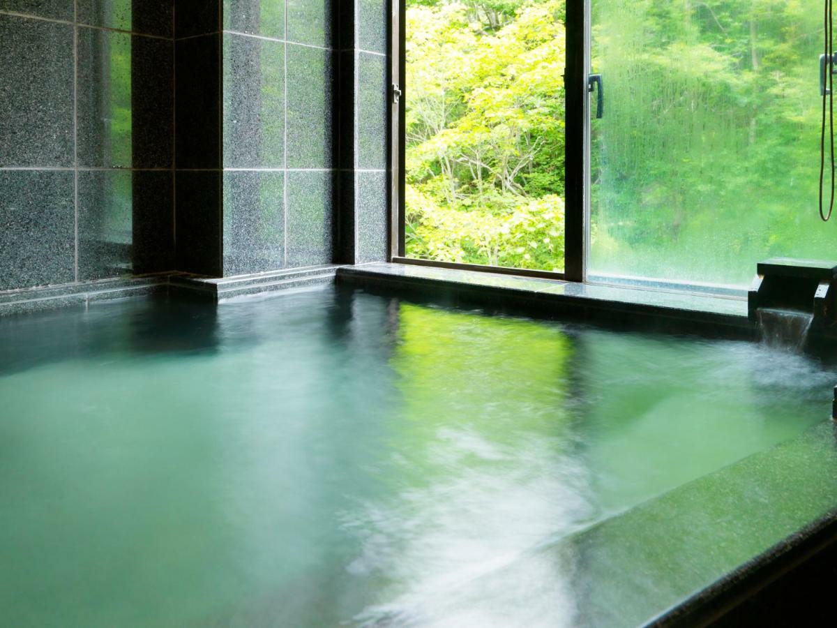 Hotel Niseko Konbu Onsen Tsuruga Moku-No-Sho Extérieur photo